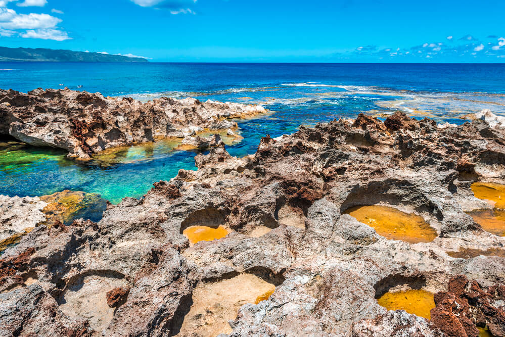 Sharks Cove on Oahu. Image of tide pools and clear blue water.
