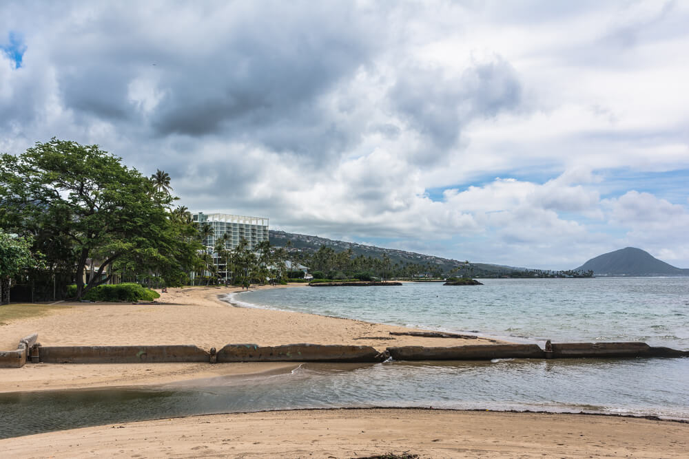 Image of a beach with a little river on Oahu
