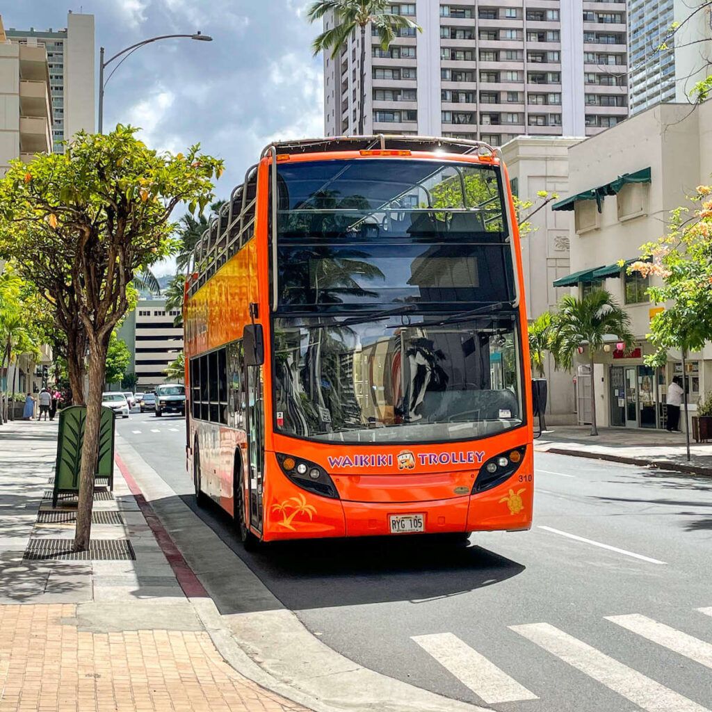 Image of an orange Waikiki Trolley in Honolulu