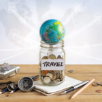Get 5 amazing Hawaii on a budget tips from top Hawaii blog Hawaii Travel Spot! Image of a jar of money with the word travel on it