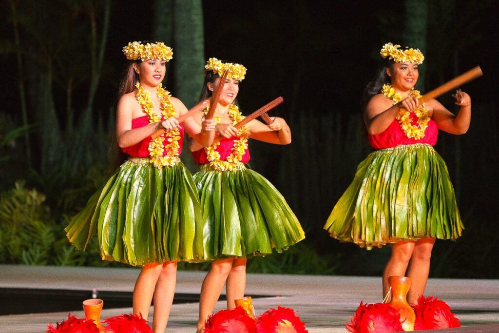 Smith Family Luau: Image of hula dancers wearing ti leaf skirts