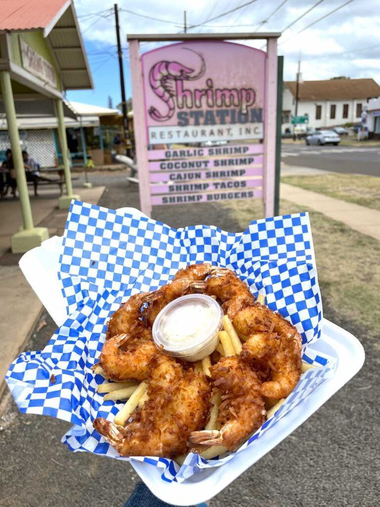 Best Cheap Kauai Eats: Image of coconut shrimp in front of the Shrimp Station sign