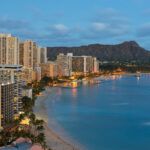 Find out the best things to do in Honolulu at night recommended by top Hawaii blog Hawaii Travel Spot! Image of Waikiki and Diamond Head at night