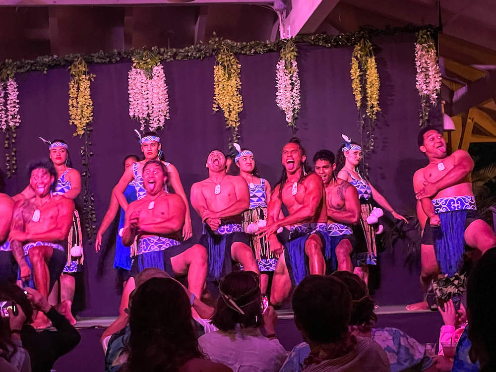Toa Luau in North Shore Oahu. Image of men in Maori costumes dancing at a luau in Hawaii