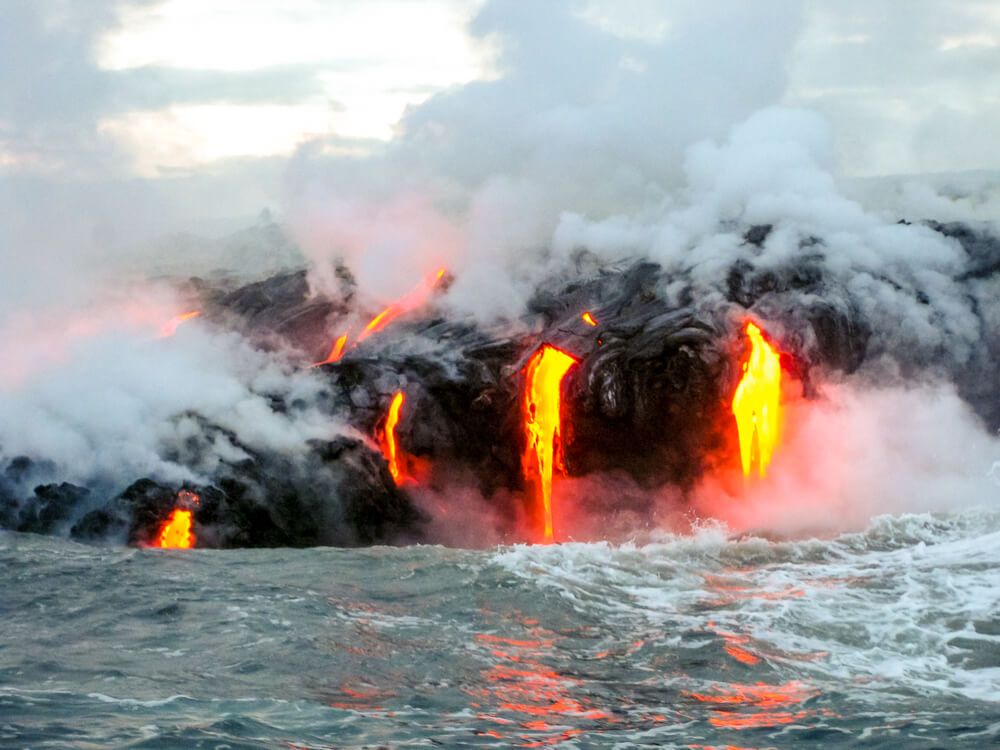 Image of lava going into the ocean on the Big Island of Hawaii