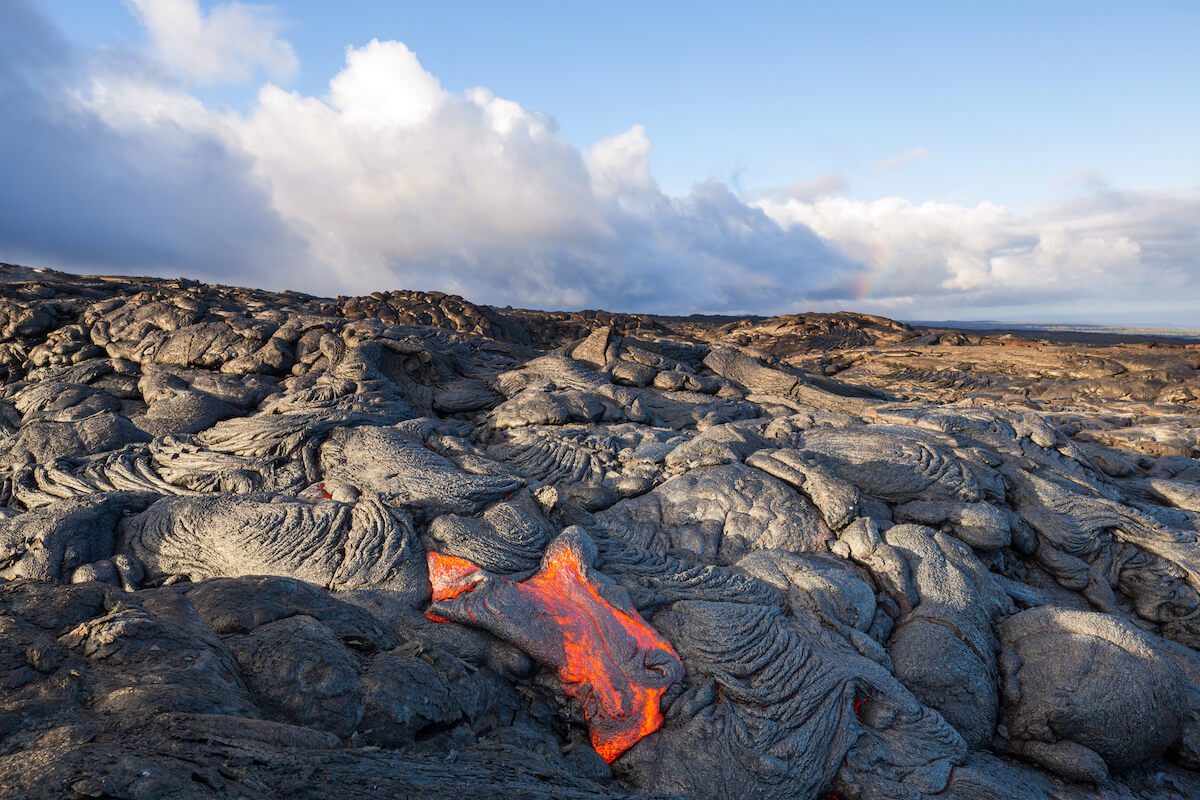 Check out these Big Island volcano tours recommended by top Hawaii blog Hawaii Travel Spot. Image of molten lava on the Big Island of Hawaii
