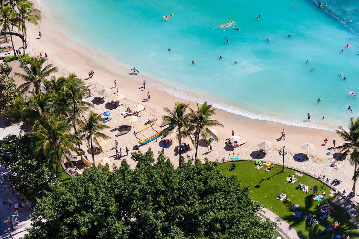 Check out this guide to Hawaii in October by top Hawaii blog Hawaii Travel Spot! Image of a beach on Oahu as seen from an Oahu hotel