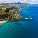 Find out how to get to North Shore from Waikiki by top Hawaii blog Hawaii Travel Spot! Image of Waimea Bay in North Shore Oahu