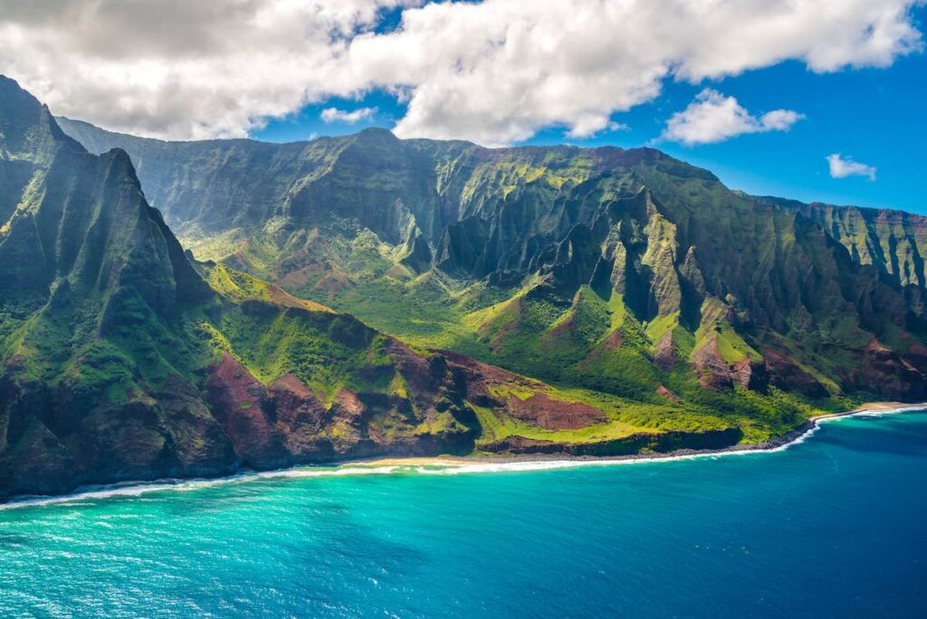 Check out the best Na Pali Coast tours on Kauai recommended by top Hawaii blog Hawaii Travel Spot! Image of the Na Pali Coast.