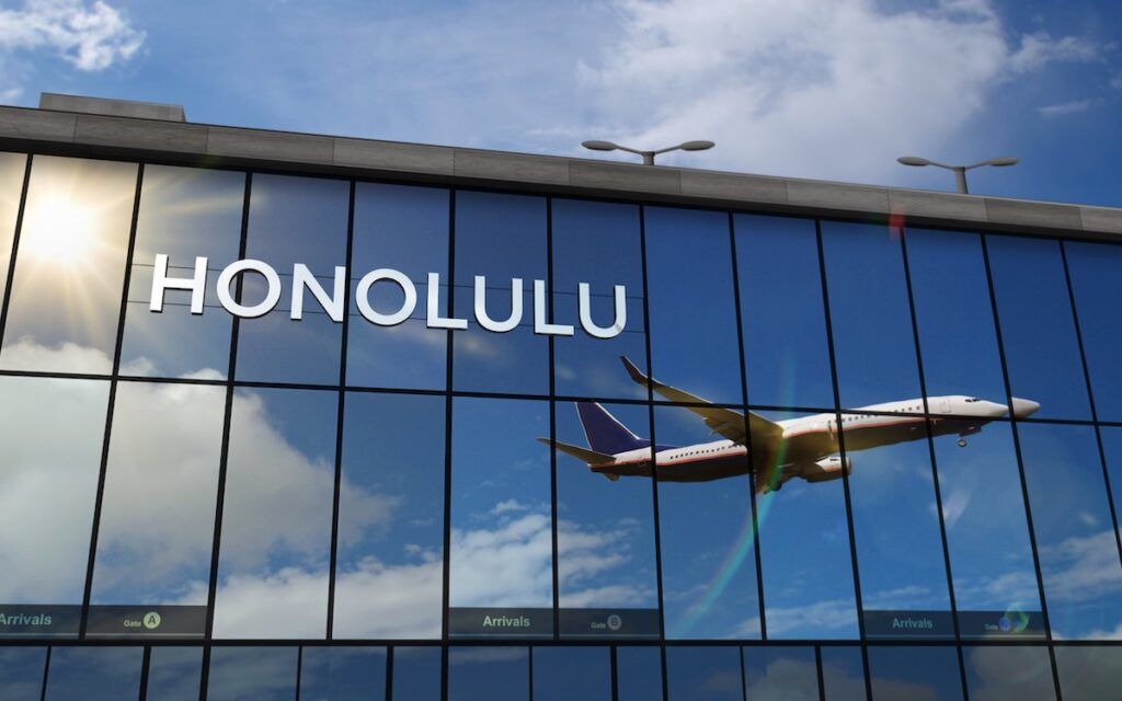 Check out these Honolulu Airport tips recommended by top Hawaii blog Hawaii Travel Spot. Image of an airplane at the Honolulu Airport on Oahu