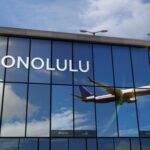 Check out these Honolulu Airport tips recommended by top Hawaii blog Hawaii Travel Spot. Image of an airplane at the Honolulu Airport on Oahu