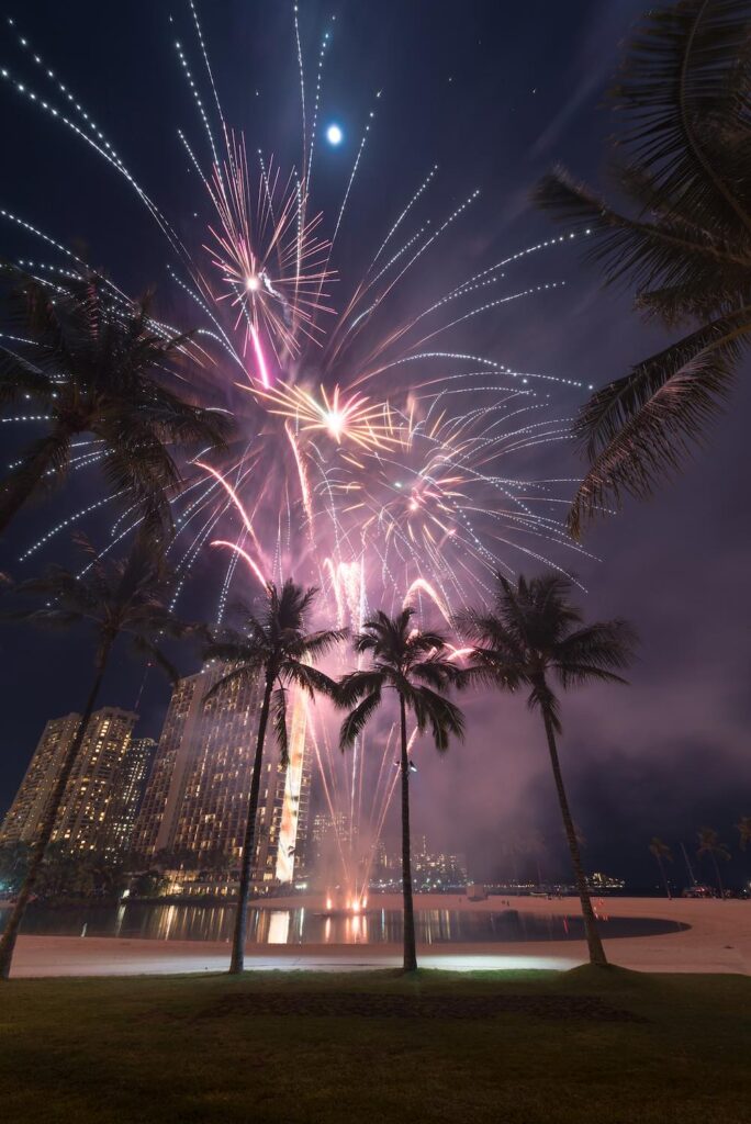 New Year's Eve in Waikiki. Image of fireworks over the Hilton Hawaiian Village.