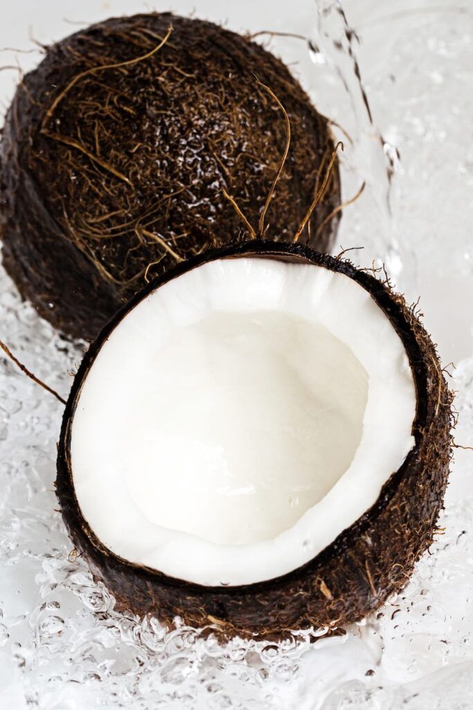 Fresh coconuts and water splash