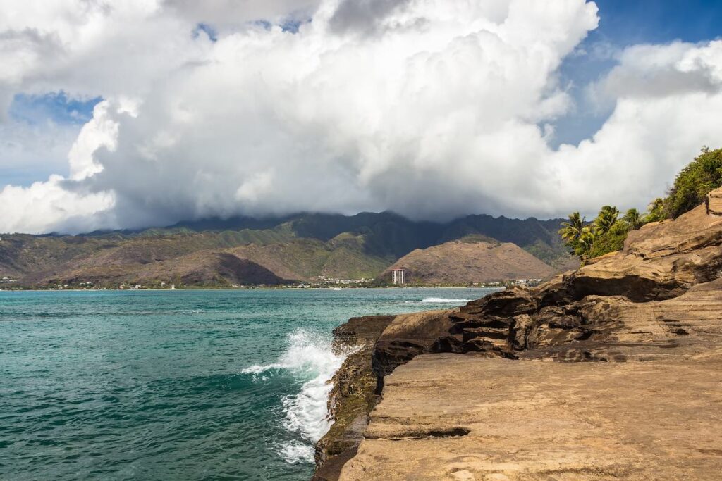 A view of Hawaii Kai and the Koolau Mountain Range from China Walls on the south shore of Oahu, Hawaii