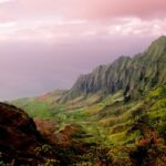 Check out the best things to do in Hawaii in May by top Hawaii blog Hawaii Travel Spot! Image of the Na Pali Coast on Kauai