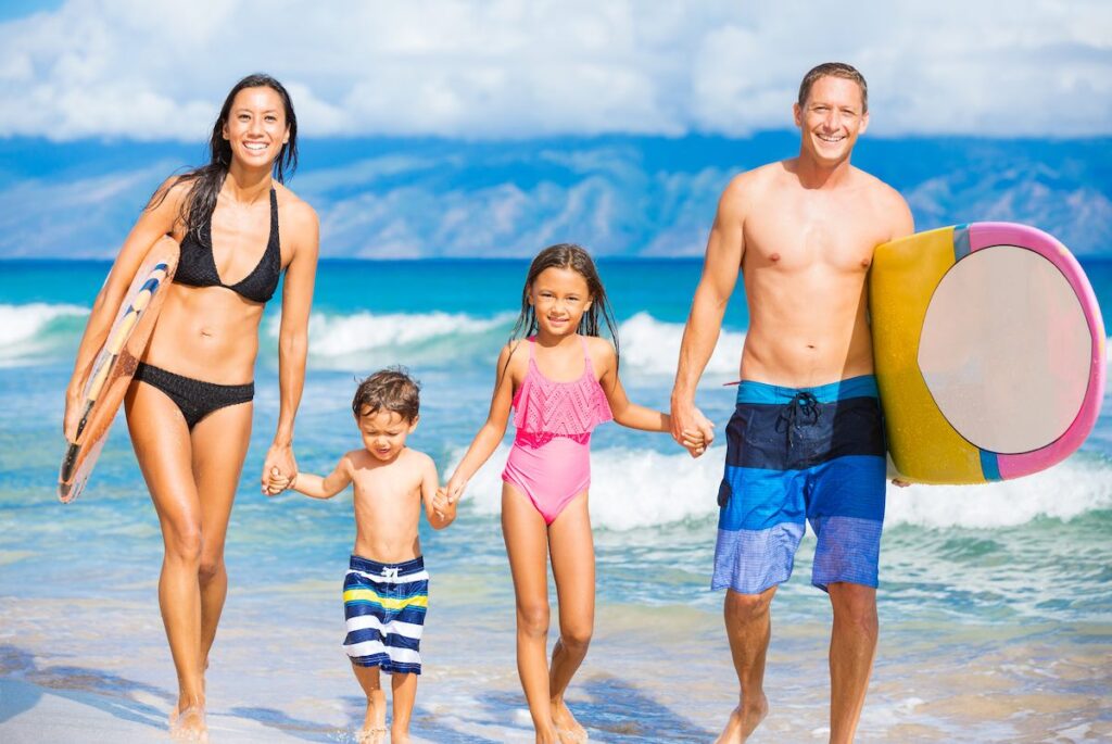 Happy Family with Surfboards on Tropical Beach, Summer Lifestyle Family Concept