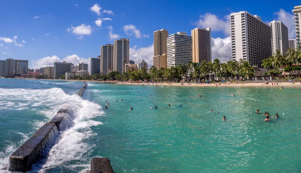 Image of people swimming at Waikiki Beach on Oahu