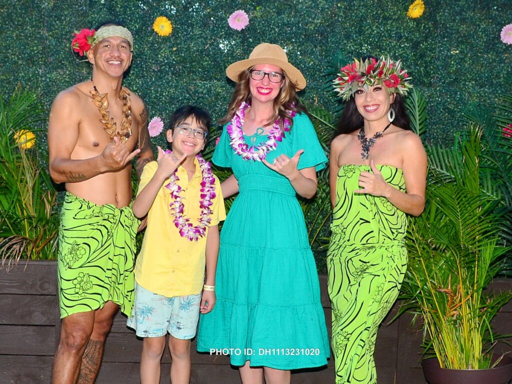 Image of Marcie Cheung of Hawaii Travel Spot and her son at the Diamond Head Luau on Oahu