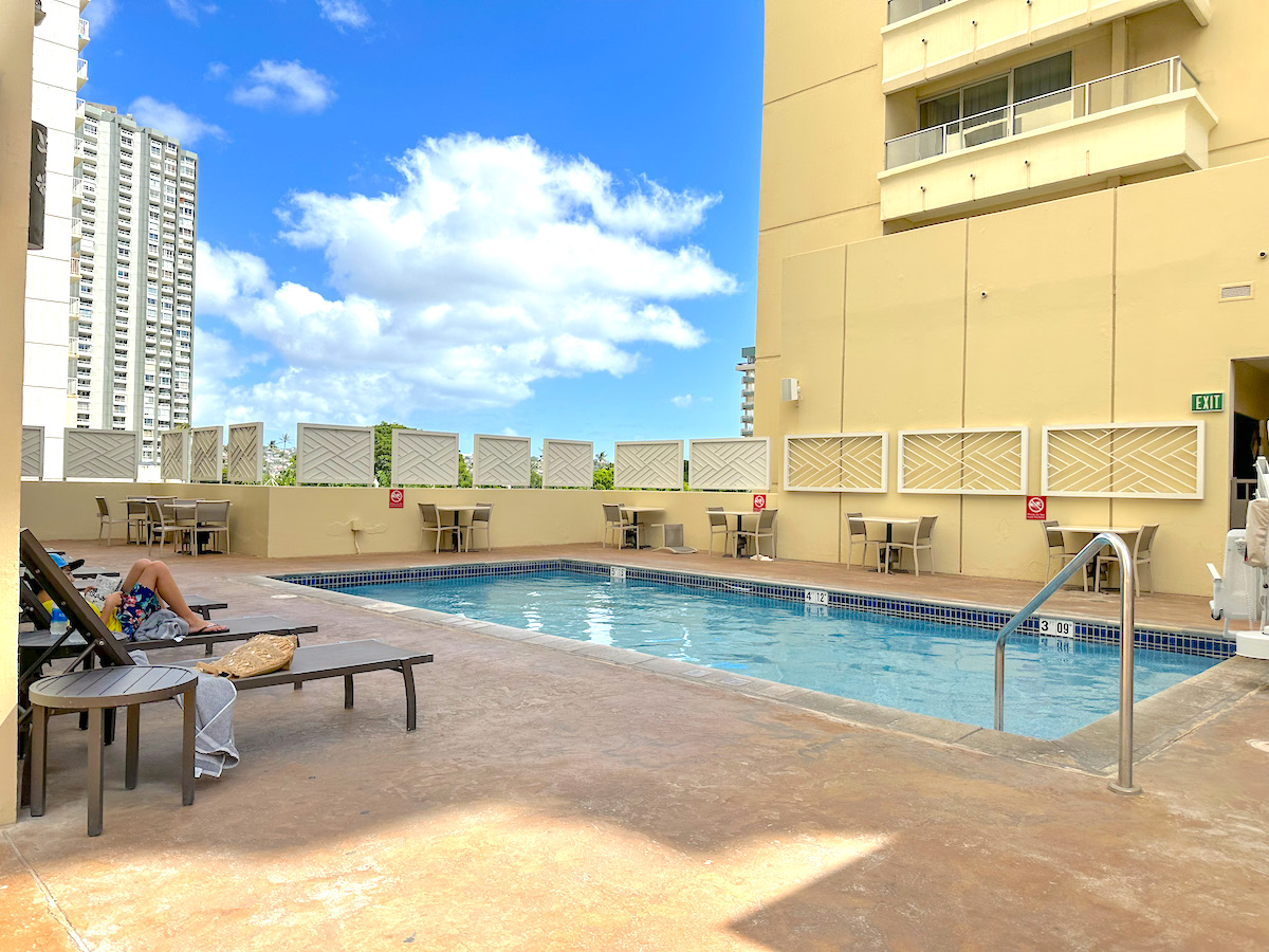 Check out this honest Hyatt Place Waikiki Beach review by top Hawaii blog Hawaii Travel Spot. Image of the pool area at Hyatt Place Waikiki Beach