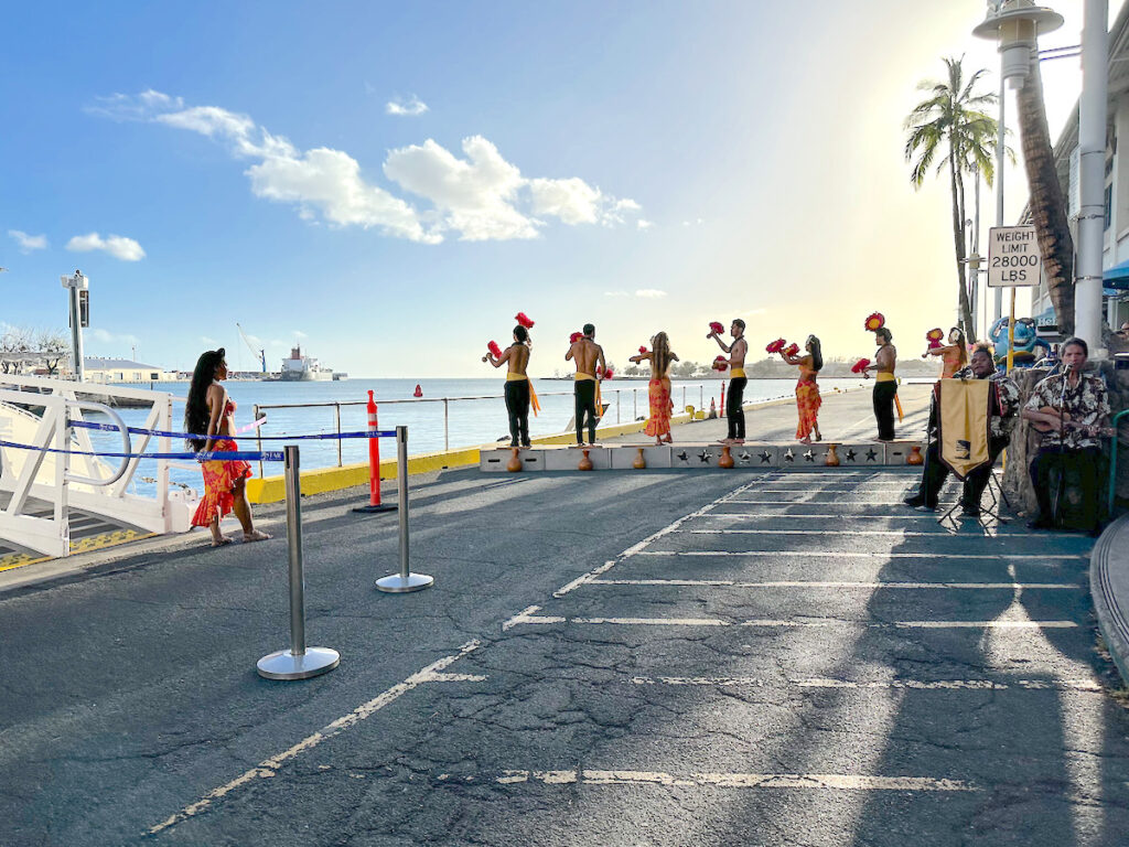 Image of hula dancers performing dockside in front of the Star of Honolulu dinner cruise on Oahu. Photo credit: Marcie Cheung