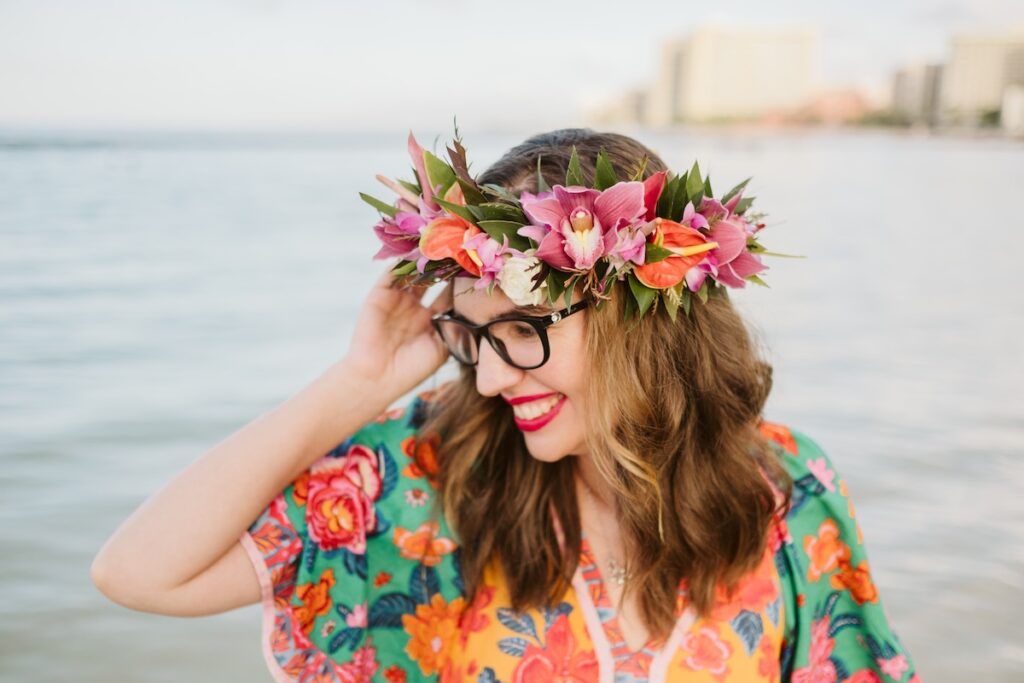 Image of Marcie Cheung of Hawaii Travel Spot posing for a Waikiki photographer. Photo credit: Natalie with Flytographer