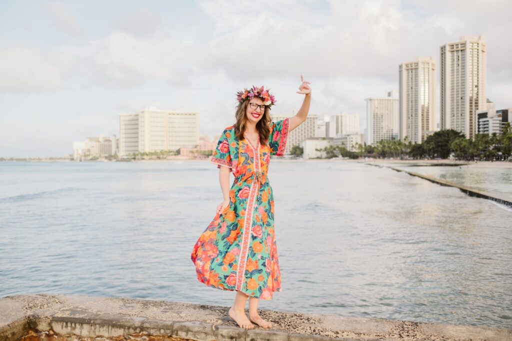 Image of Marcie Cheung of Hawaii Travel Spot posing for a Waikiki photographer. Photo credit: Natalie with Flytographer